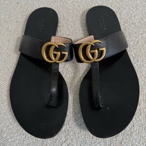 Gucci Women's Sandals in Black with Gold Accents